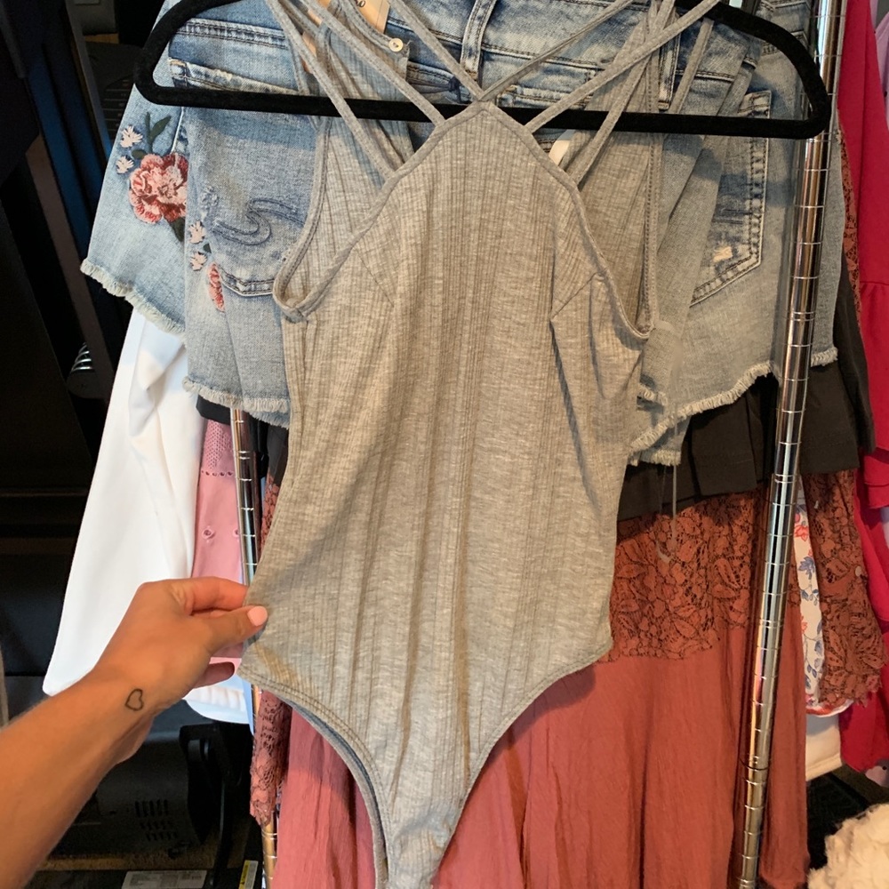 Grey body suit